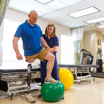 A TIRR Memorial Hermann patient practices balancing with Osseointegration.