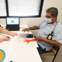 TIRR Memorial Hermann patient shown performing task-specific therapy