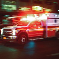 Ambulance going through city