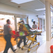 Patient wheeled through ER